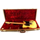 A Fender American vintage 1952 re-issue Telecaster Butterscotch Blonde with black scratch plate,