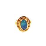 An 18ct gold opal and diamond ring,