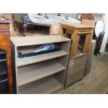 A nest of oak tables, a bookcase,