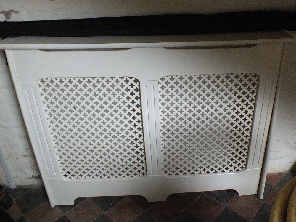 A white radiator cover