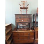 A childs rush seat chair with rabbit decorated inlaid back, oak chest of drawers,