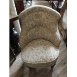 A tapestry upholstered low chair plus a Victorian carved mahogany chair