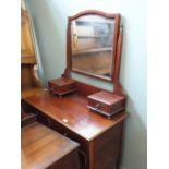 An Edwardian mahogany two over two drawers dressing table