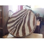 An African zebra skin drum