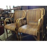 A set of four cane conservatory chairs plus a cane desk with single drawer