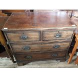 A 19th Century mahogany two short over two long drawers on bracket feet
