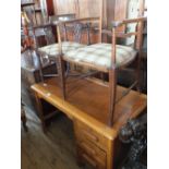 An Edwardian inlaid elbow chair and tub chair plus an oak pedestal desk