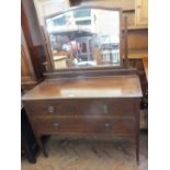 A mahogany two over one drawer dressing table