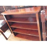 A mahogany four shelf bookcase