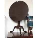 A 19th Century mahogany circular snap top tripod table