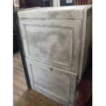 A white painted pine two door cupboard