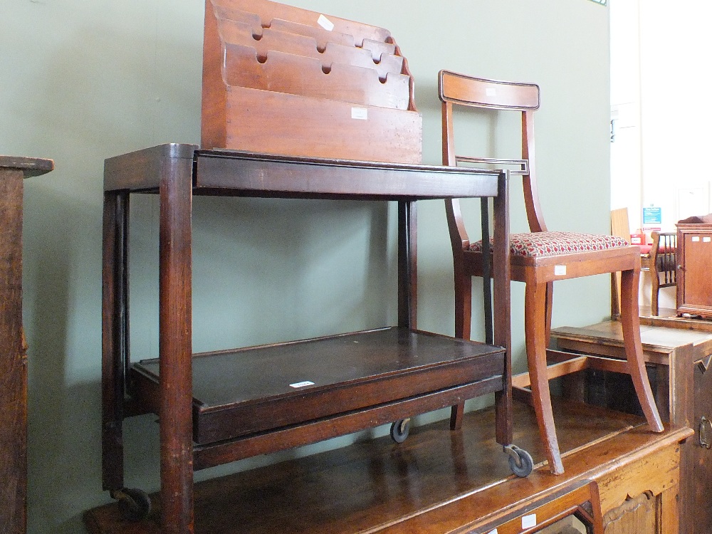 A mahogany stationery rack, dining chair,