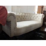A Victorian button back Chesterfield with brown tweed upholstery