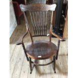 An American spindle back rocking chair