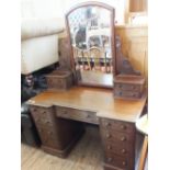 A Victorian mahogany knee hole dressing table