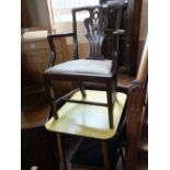 A Georgian mahogany Chippendale style elbow chair,