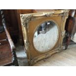 A gilt wood decorative wall mirror