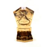 An Arts and Crafts double socket brass wall sconce, the back plate embossed with crinoline lady,