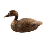 A Canadian decoy duck with black and yellow mottled decoration to incised body,