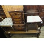 A reproduction miniature mahogany chest on chest of eight drawers,