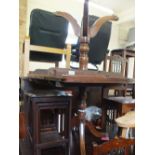 A reproduction mahogany D end table with single leaf