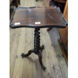 A Victorian mahogany tray top tripod table on barley twist column