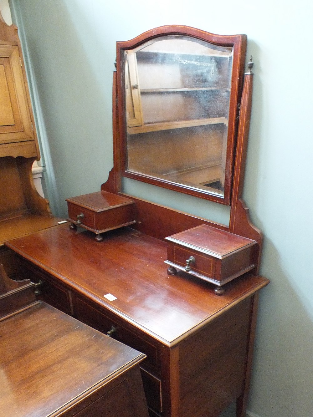 An Edwardian mahogany two over two drawers dressing table