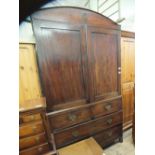 A 19th Century mahogany linen press over two short and two long drawers