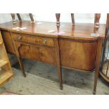 An Edwardian inlaid mahogany sideboard