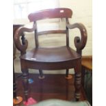 A pair of 19th Century hollow seat elbow chairs