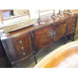 A reproduction mahogany shaped front sideboard and corner cupboard