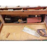 A tool box containing chisels,