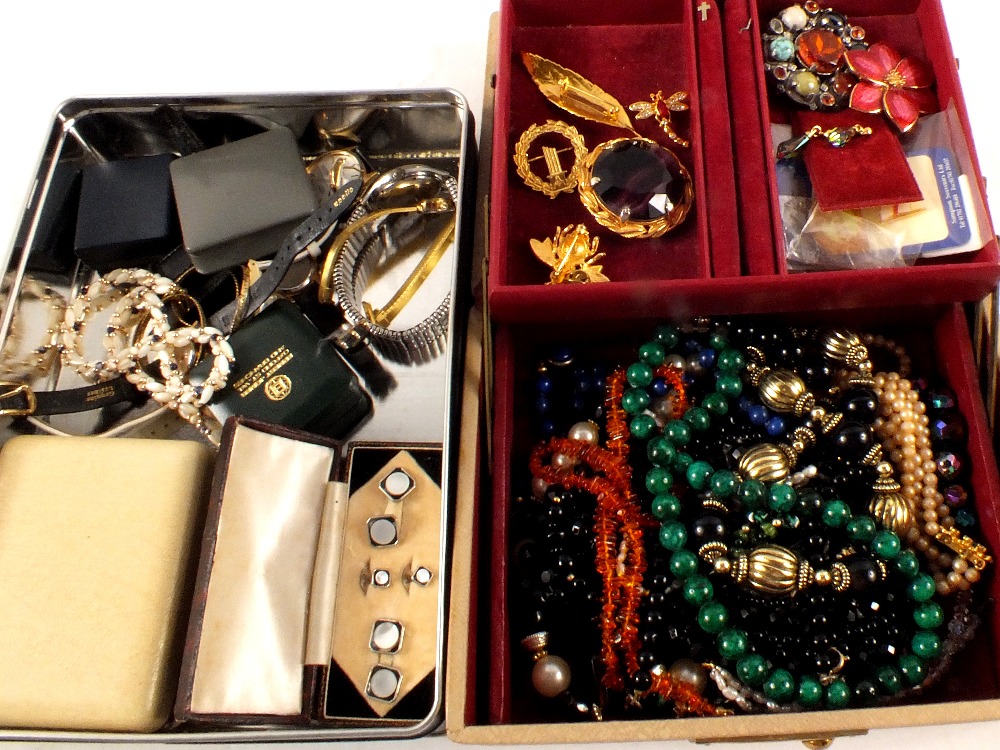 Two boxes of costume jewellery including earrings,