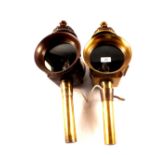 A pair of brass car style electric lamps