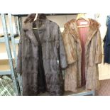 Two ladies brown fur coats