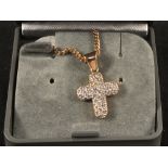 A 14ct gold white stone set cross on a 9ct gold chain