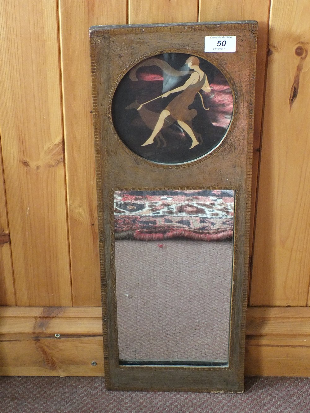 An Art Deco gilt mirror with inlaid decorations, Rowley Gallery label title 'Girl with Dog W.J.