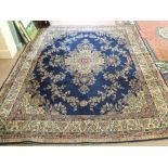 A machine made floral Persian pattern carpet,