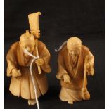 A pair of Japanese ivory okimonos of artisans