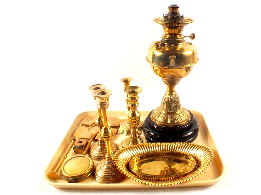 A brass oil lamp,