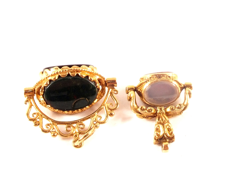 Two 9ct gold revolving stone set fobs