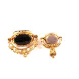 Two 9ct gold revolving stone set fobs