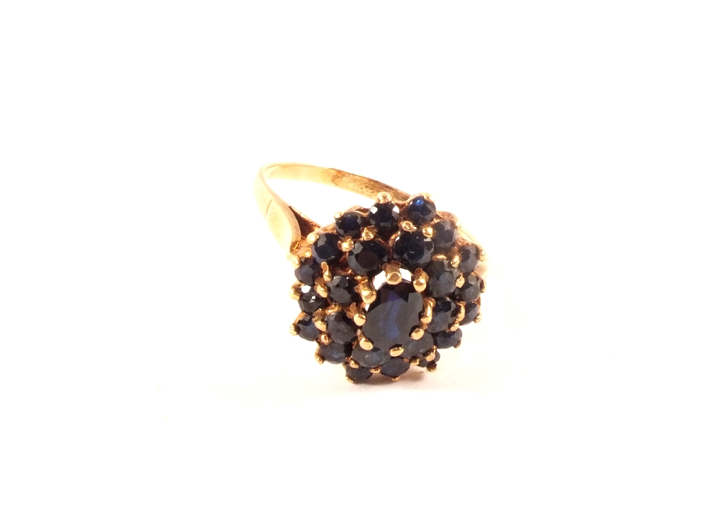 A 9ct gold sapphire set cluster ring,