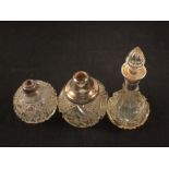 Three silver mounted cut glass scent bottles