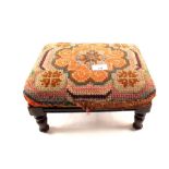 A Victorian mahogany tapestry upholstered footstool