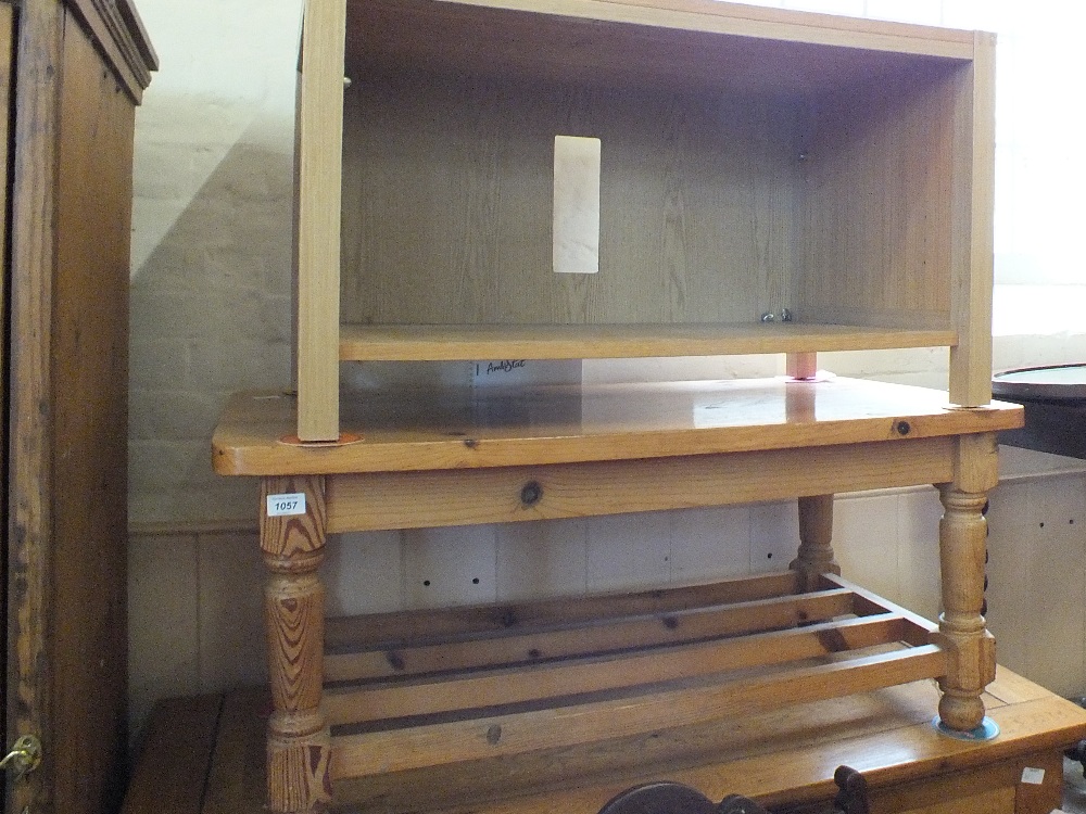 A pine coffee table and occasional TV stand