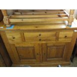 A heavy light oak four drawer,