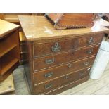 An oak chest of two short and three long drawers with later added brass handles