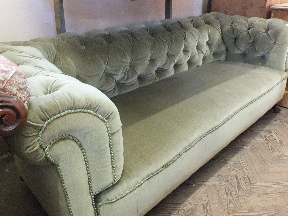 A light green draylon upholstered Chesterfield sofa