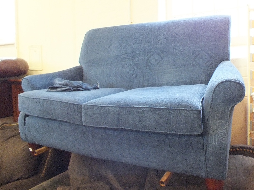 A modern Multiyork blue upholstered two seater sofa